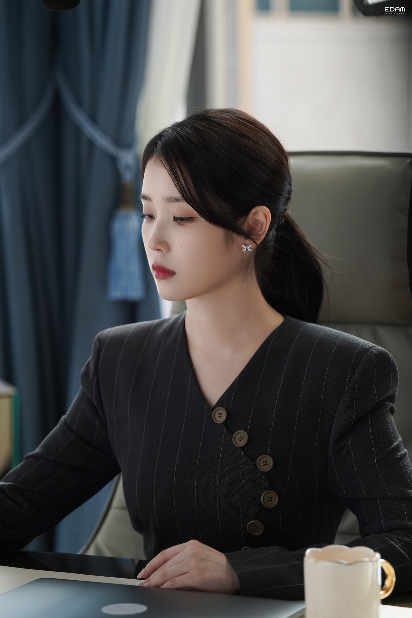 Behind-the-scenes cut of IU