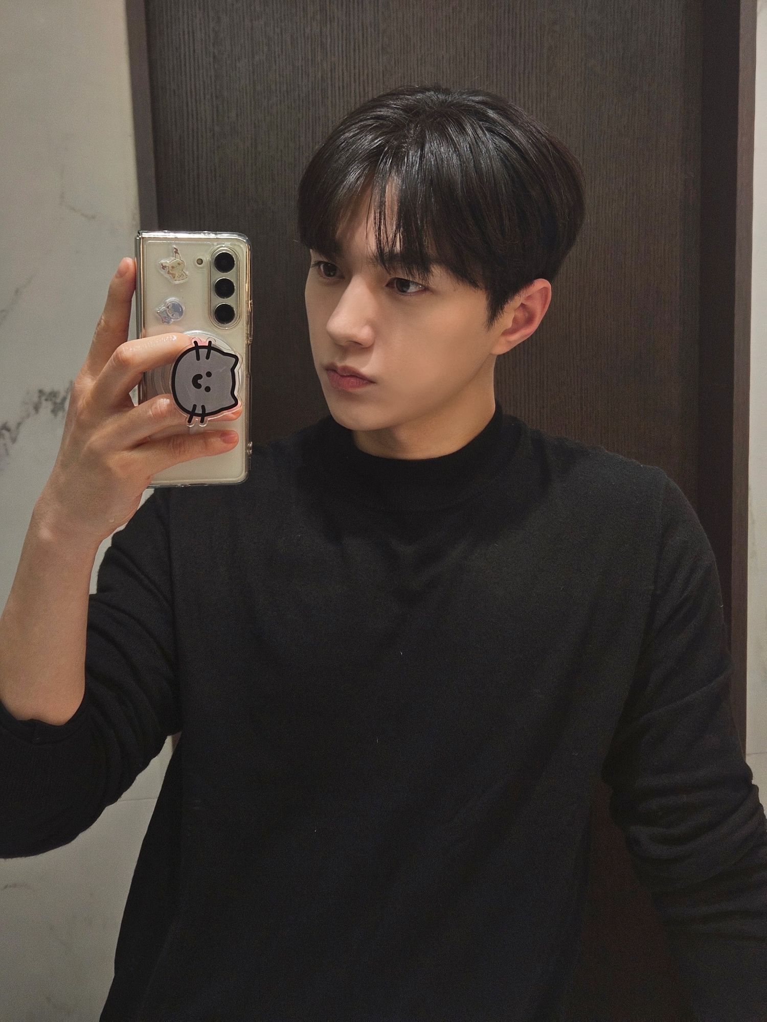 Recent activity shot of Kim Myungsoo (L)