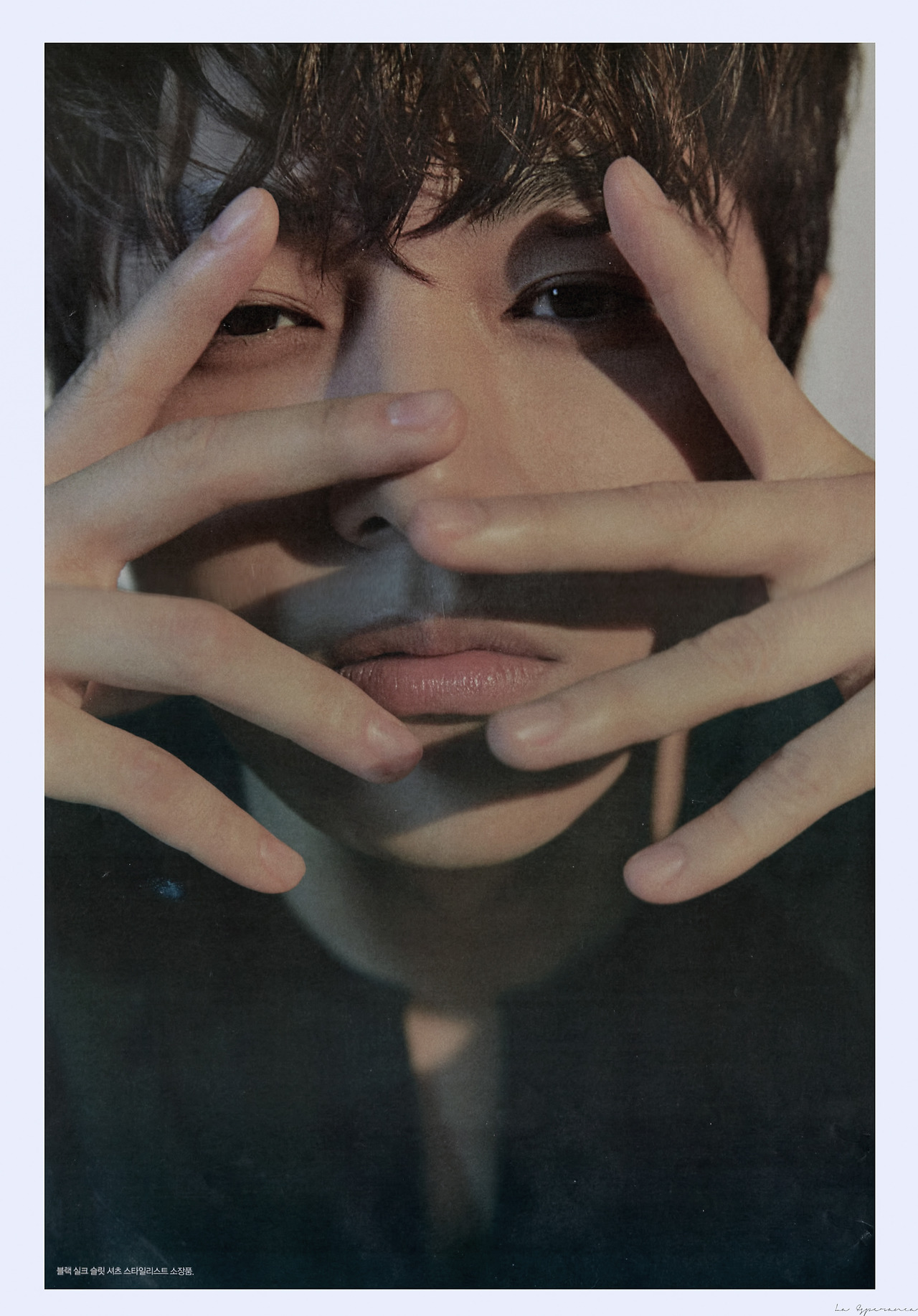 Behind-the-scenes cut of Kim Myungsoo (L)